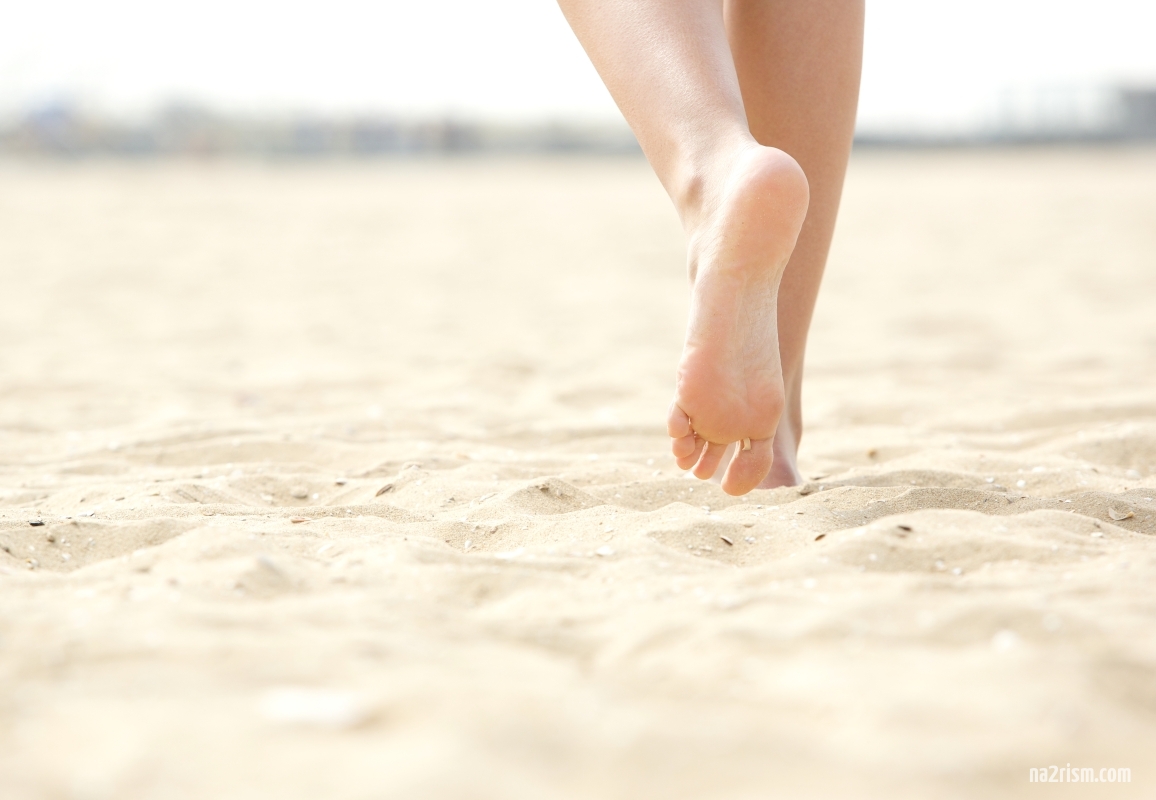 What type of ground is most useful for walking barefoot?