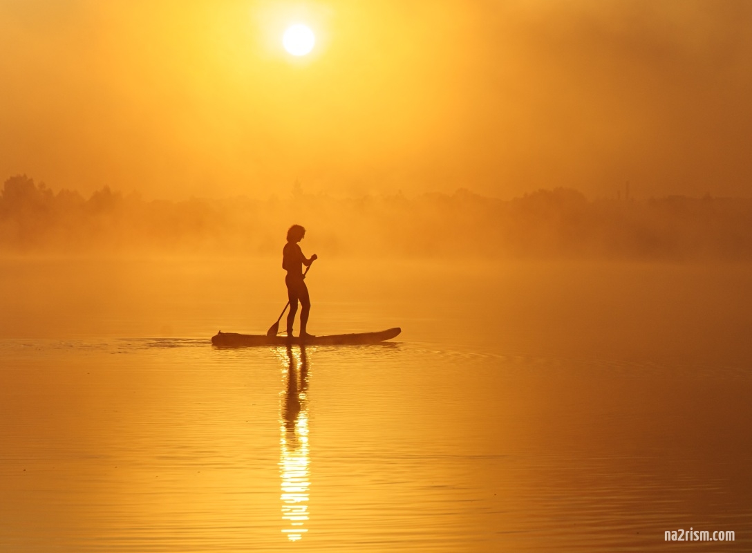 Nude standup paddleboarding experiences